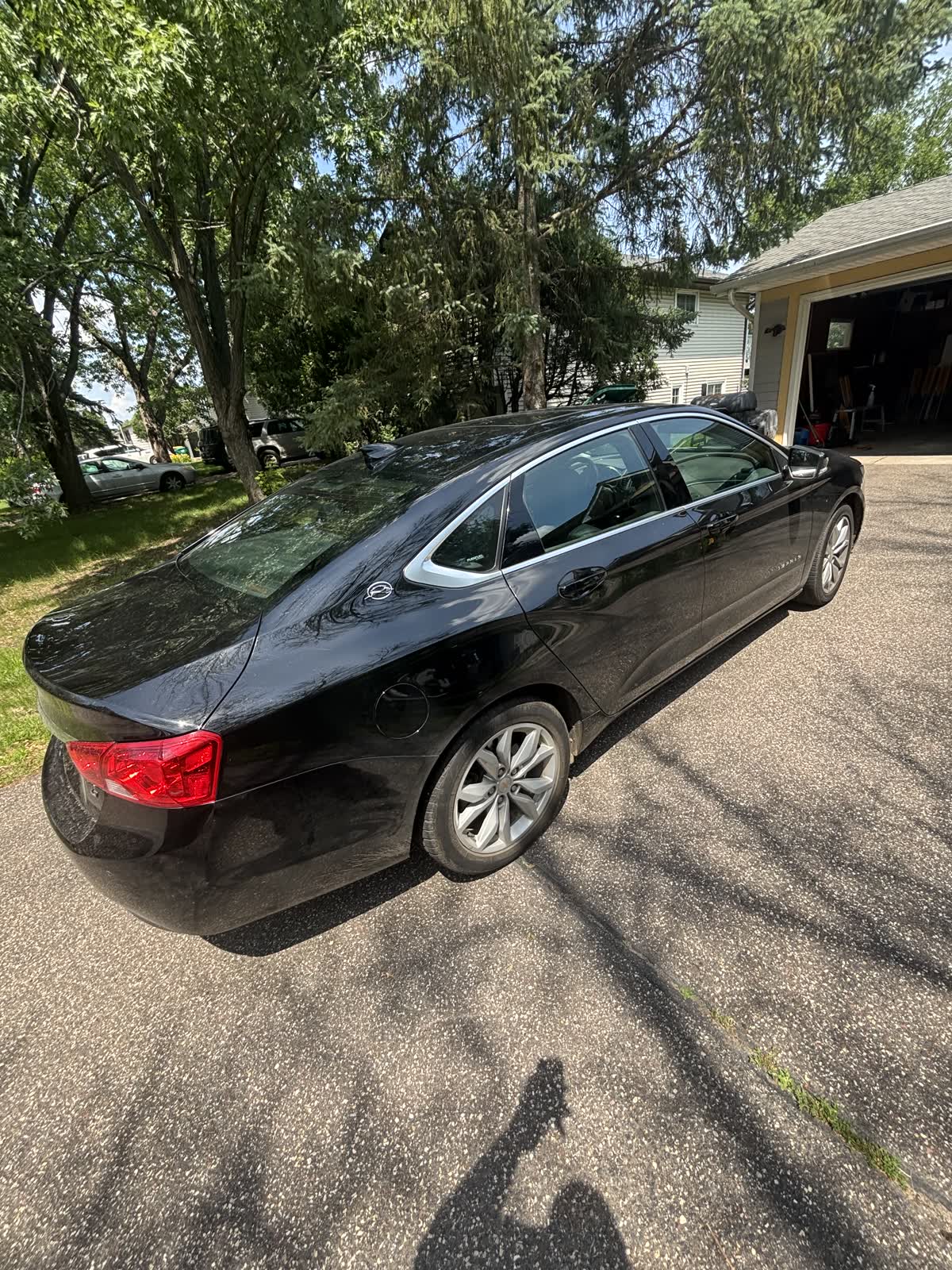 Black sedan with finished automotive window tint